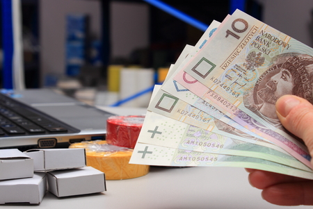 Paying for shopping in an electrical shopの写真素材