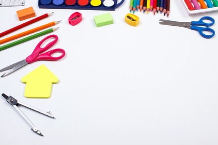 School and office accessories on white background, back to school concept, copy space for text or inscriptionの写真素材