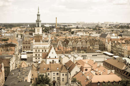 Vintage photo, View from tower on town hall, old and modern buildings in polish city Poznan, Greater...