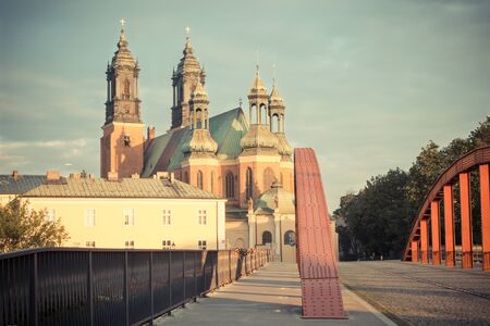 Poznan, Poland - June 29, 2016: Vintage photo, View on bridge and cathedral church of St. Peter and St. Paul in polish city Poznan on Ostrow Tumski squareのeditorial素材