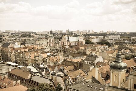 Poznan, Poland - June 28, 2016: Vintage photo, View from tower on old and modern buildings and collegiate church in polish city Poznanのeditorial素材