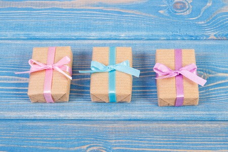Wrapped gifts with colorful ribbons for Christmas, Valentine, birthday or other celebration lying on...