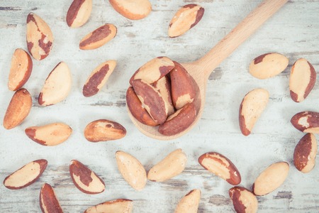 Vintage photo, Brazil nuts containing natural minerals and vitamin, concept of healthy nutrition