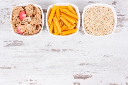 Natural food containing carbohydrates, dietary fiber and minerals, concept of healthy nutrition, copy space for textの写真素材