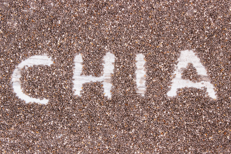 Inscription chia and seeds as source natural vitamins, minerals and dietary fiber, concept of healthy food and nutritionの写真素材