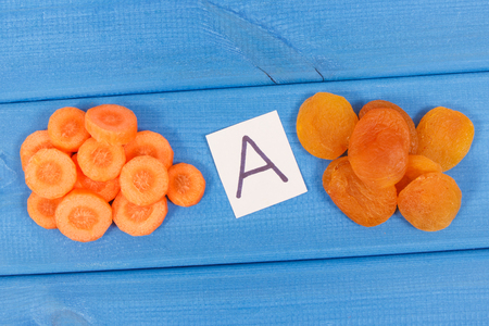 Dried apricot and fresh carrot as source vitamin A, dietary fiber and natural mineralsの写真素材