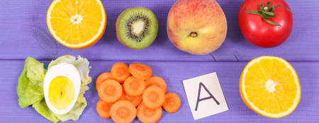 Fresh fruits with vegetables containing vitamin A and fiber, healthy nutrition as source natural mineralsの写真素材