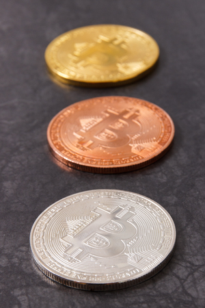 Bitcoin on dark background, symbol of new electronic virtual money and mining cryptocurrency