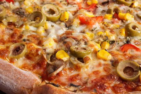 Fresh baked vegetarian pizza with vegetable, italian cuisine, fast foodの写真素材