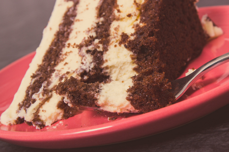 Fresh creamy sweet cake with different layers, delicious dessert for celebrations concept. Vintage...