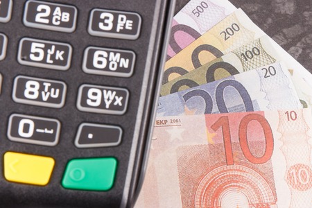 Payment terminal and curriencies euro. Choice between cashless or cash paying for shopping. Finance...
