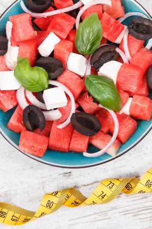 Fresh prepared summer salad of watermelon and feta cheese. Healthy meal containing natural vitamins and mineralsの写真素材