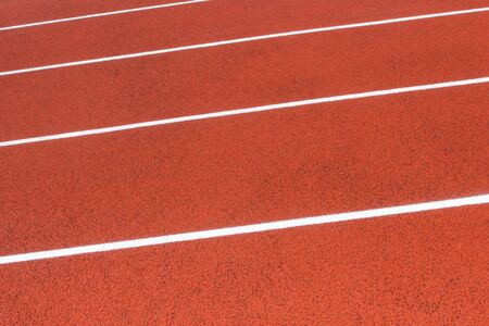 Red treadmill in sport field.の写真素材