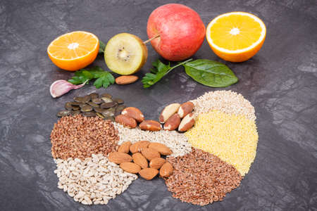 Nutritious natural ingredients in shape of thyroid. Healthy food as source vitamins and minerals....
