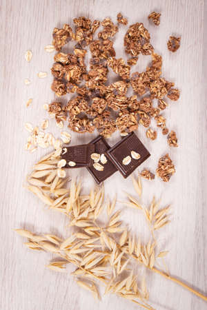 Granola, oat flakes and chocolate as source iron, concept of healthy food for breakfast