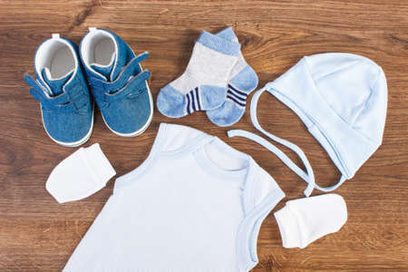 Baby clothing for newborn, expecting for kids and extending family conceptの写真素材