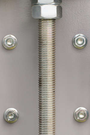 Screws and bolts as part of industrial or agricultural machine, technology concept