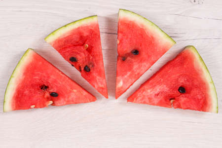 Slice of fresh watermelon, concept of healthy delicious and juicy dessertの写真素材