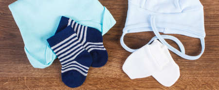 Blue clothing for baby boy, expecting for kids and extending family concept