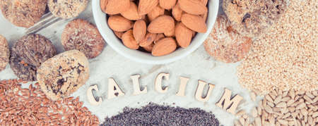 Vintage photo, Inscription calcium and natural food containing dietary fiber and minerals, concept of healthy nutritionの写真素材