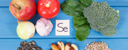 Natural ingredients or products as source selenium, vitamins, minerals and dietary fiber, healthy nutrition conceptの写真素材