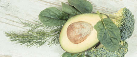 Natural green ingredients or products as source vitamins and minerals, healthy nutrition conceptの写真素材