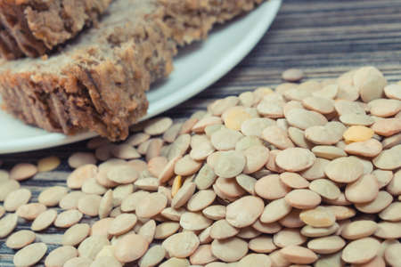 Green lentil seeds containing natural vitamins and fresh baked homemade pate. Healthy eating