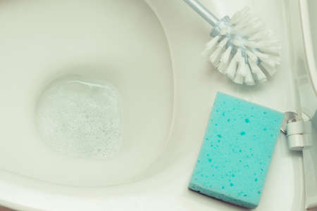 Domestic accessories for cleaning toilet in bathroom. Household duties conceptの写真素材
