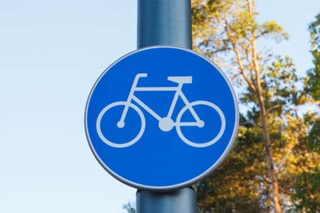 Blue round bicycle lane sign. Marking bicycle pathの写真素材