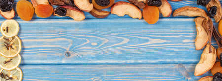 Frame of dried fruits and spices for preparing beverage or compote, healthy nutrition, copy space...