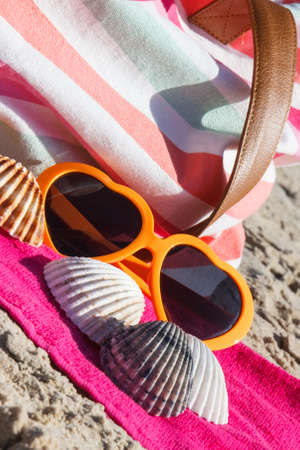 Accessories using for relax on sand at beach. Travel and vacation time conceptの写真素材