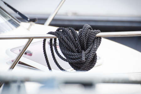 Black rope as part and detail of yacht. Tavel, transportationの写真素材