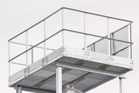 Ladder on silo for storage grain after harvest. Part and detail of agricultural equipments