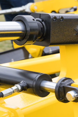 Black pistons or actuators as part of pneumatic or hydraulic machine. Technology and engineeringの写真素材