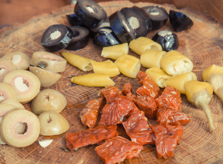 Fresh peppers and olives. Healthy food containing natural vitamins. Mediterranean snack