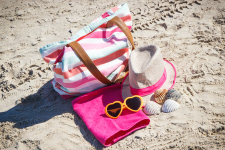 Accessories for relax on sand at beach. Travel and vacation time conceptの写真素材