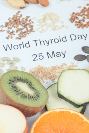 Inscription World Thyroid Day 25 May and best nutritious ingredients for healthy thyroid. white backgroundの写真素材