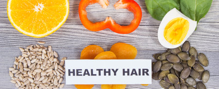 Fresh healthy eating containing various natural vitamins or minerals. Hair in good condition conceptの写真素材