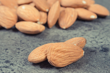 Fresh healthy almonds containing natural vitamins and minerals. Nutritious eatingの写真素材
