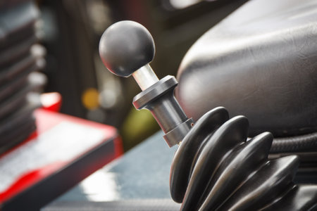 Gear shift lever in tractor, excavator or other agricultural and industrial machine. transportationの写真素材