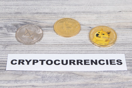 Coins and cryptocurrencies inscription. Symbol of cryptocurrency. International network payments. Finance conceptの写真素材