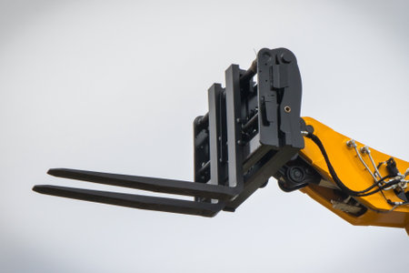 Forklift loader or stacker. Part of hydraulic and pneumatic mechanism in industrial machine. Technology in transportの写真素材