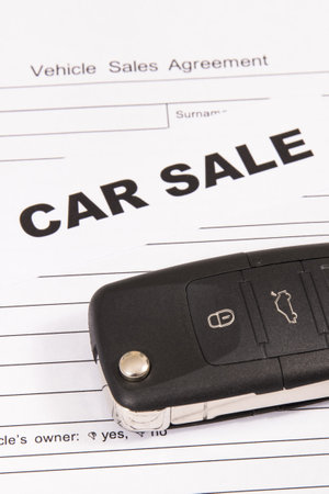 Vehicle sales agreement, black key and inscription car sale. Sales and buying new or used carsの写真素材