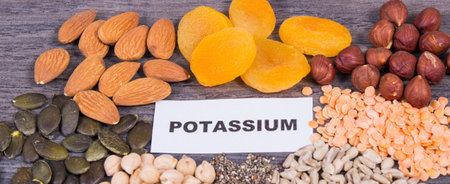 Inscription potassium with nutritious various ingredients containing natural minerals and vitamin Kの写真素材