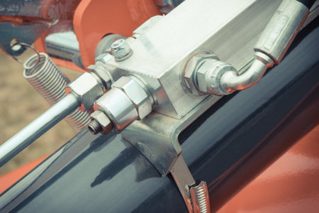 Part of hydraulic or pneumatic mechanism in industrial or agricultural machine. Technology and engineeringの写真素材