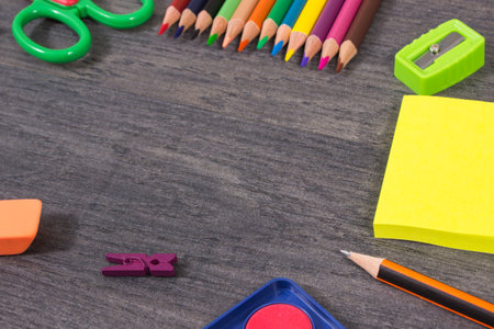 Different colorful stationery accessories and school supplies. Learning, developing creativity. Kids motor skills. Copy space for text or inscriptionの写真素材
