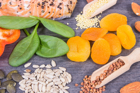 Various nutritious products or ingredients containing natural vitamins and minerals for healthy and lush hairの写真素材