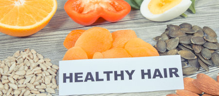 Best nutritious food as source differents natural vitamins or minerals for healthy and lush hairの写真素材