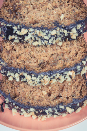 Fresh baked homemade pastry made of zucchini with nuts and raises. White backgroundの写真素材