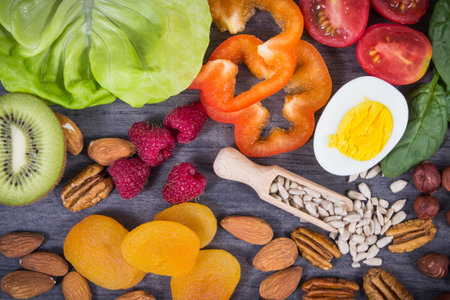 Various ingredients containing natural vitamin E, other minerals and dietary fiber. Healthy lifestyle and nutritionの写真素材